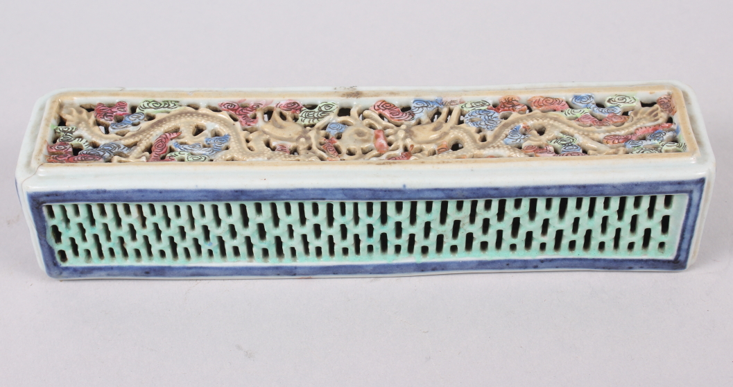 A Chinese cricket box, decorated dragons, 8 1/4" wide