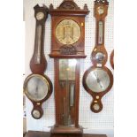 An Admiral Fitzroy barometer, in carved wooden case, 44" high (damages)