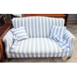 A 19th century three-seat settee, upholstered in a blue and white stripe fabric, on short square