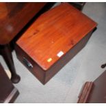 A brown stained pine box, three brown suitcases and a stool with seagrass seat