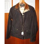 A lady's Barbour waxed cotton jacket, size 10