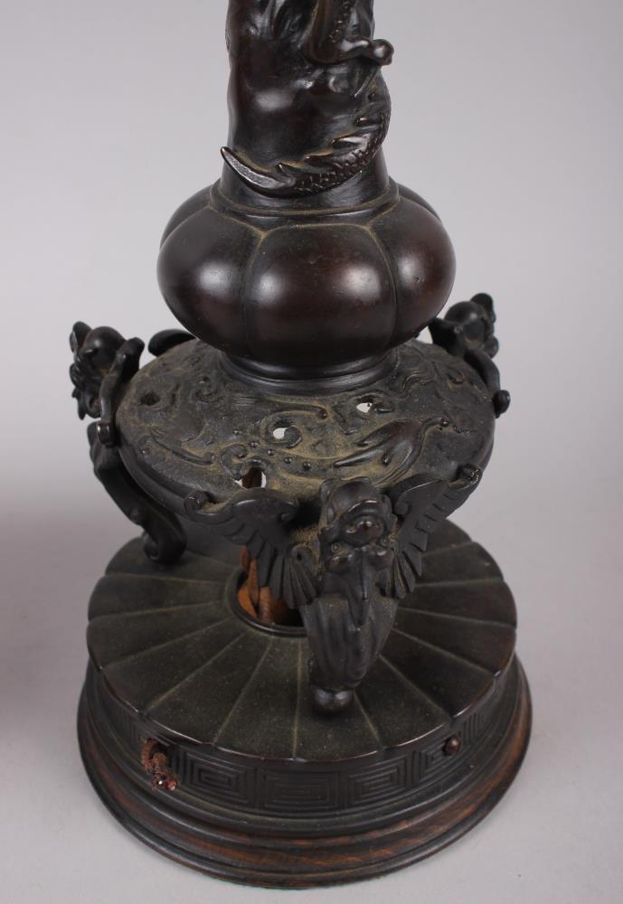 A pair of Chinese bronze table lamps with relief dragon decoration, on circular bases, 17 1/2" high - Image 5 of 6