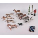 A collection of carved wooden articulated animals (damages)