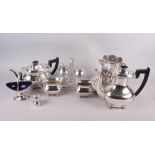 A silver plated four-piece teaset, a glass and plated dessert cruet, formed as apples, a plated