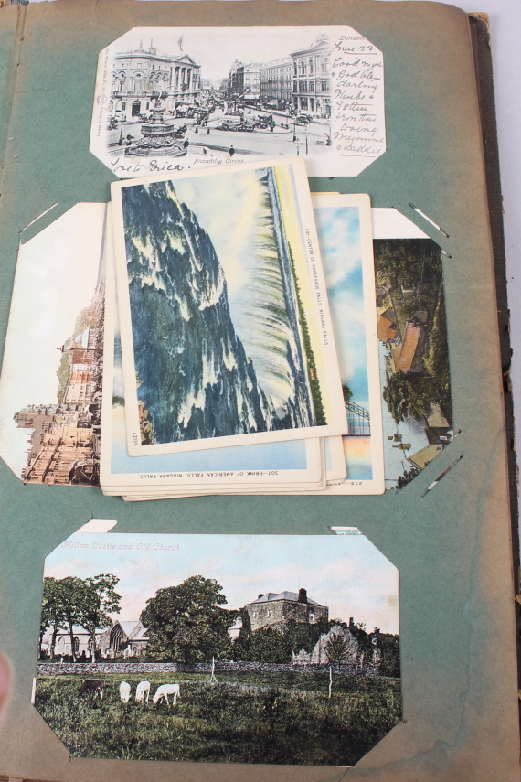 An album containing early 20th century postcards, including views of Niagara Falls