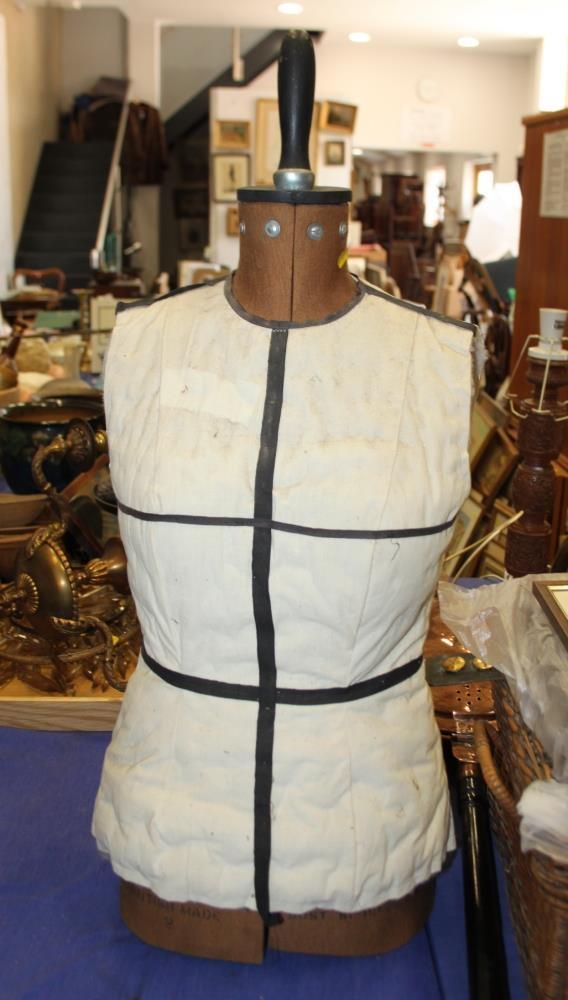 A fabric dressmaker's mannequin
