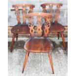 A set of four Ercol single chairs with triple splats pierced Prince of Wales feathers