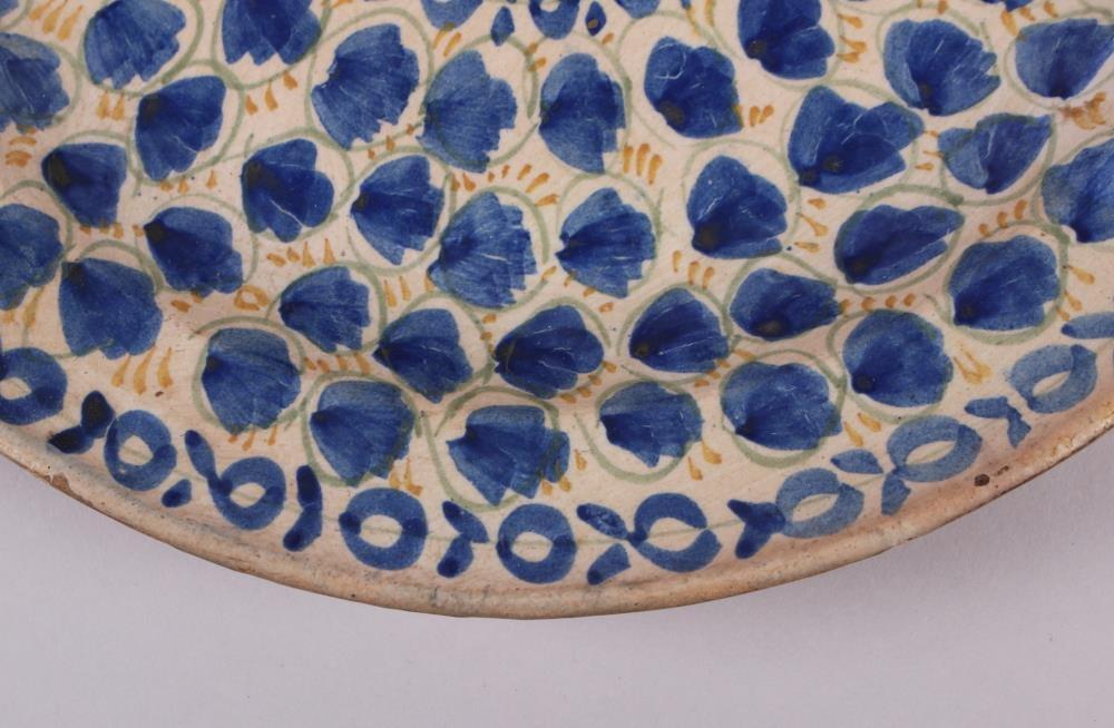 An 18th century Delft plate with all-over leaf and tendril design, 12" dia (rim chips) - Image 6 of 7