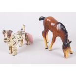 A cold painted bronze statue of a terrier, 3 1/2" long, and a ceramic model of a foal