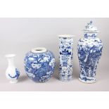 A Chinese blue and white cylindrical vase with flared hip, decorated men carrying an urn, 12 1/4"