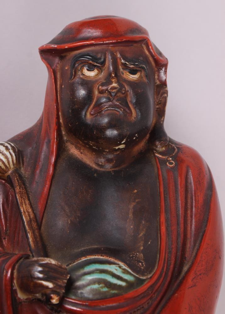 A Chinese porcelain figure of Daruma with a fly whisk, 15" high - Image 6 of 8