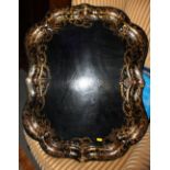 A 19th century papier-mache tray with gilt decorated border, 30" x 23"