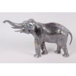 A silver plated model of an elephant, 10" high