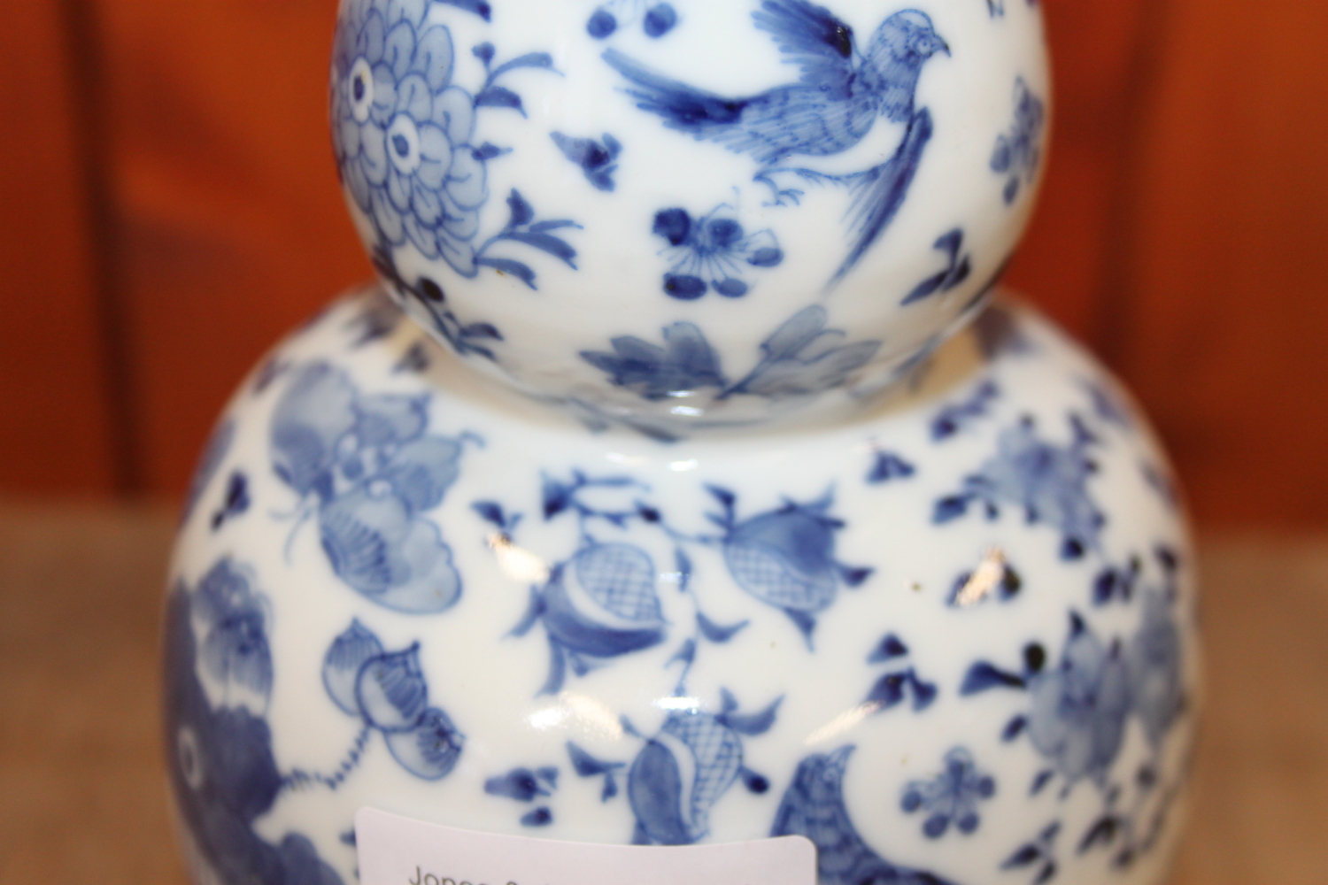 A 19th century Chinese blue and white double gourd vase, decorated birds amongst foliage, 7" high - Image 7 of 11