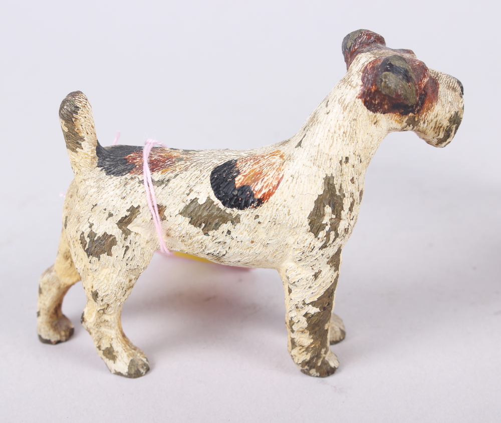 A cold painted bronze statue of a terrier, 3 1/2" long, and a ceramic model of a foal - Image 2 of 3