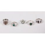 Five silver and white metal dress rings, various