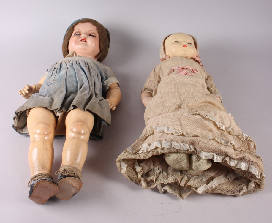 An Armand & Marseille bisque doll with sleeping eyes, closed mouth, jointed body and original