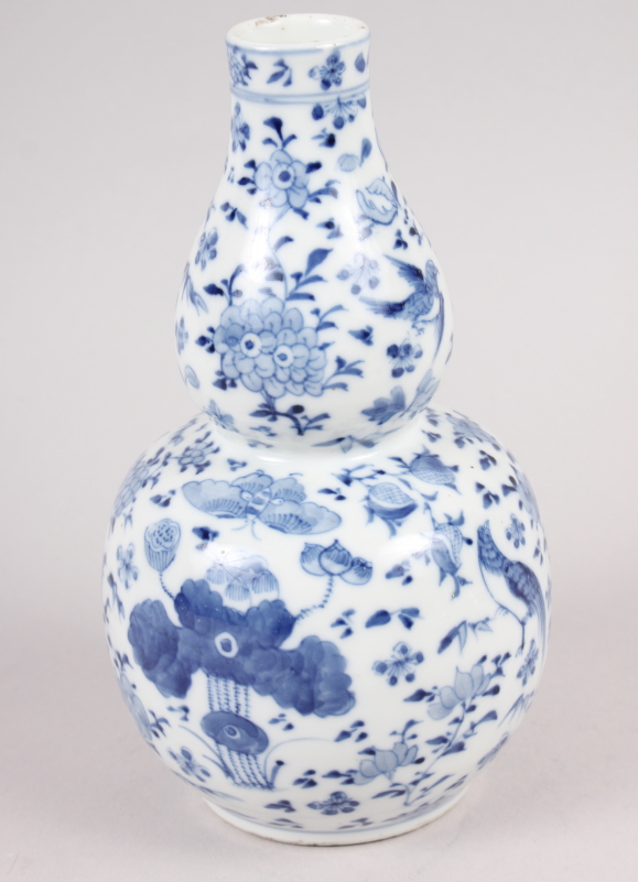 A 19th century Chinese blue and white double gourd vase, decorated birds amongst foliage, 7" high - Image 4 of 11