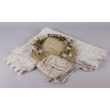 A Victorian wedding veil, a wedding garland, an infants cap and other textiles