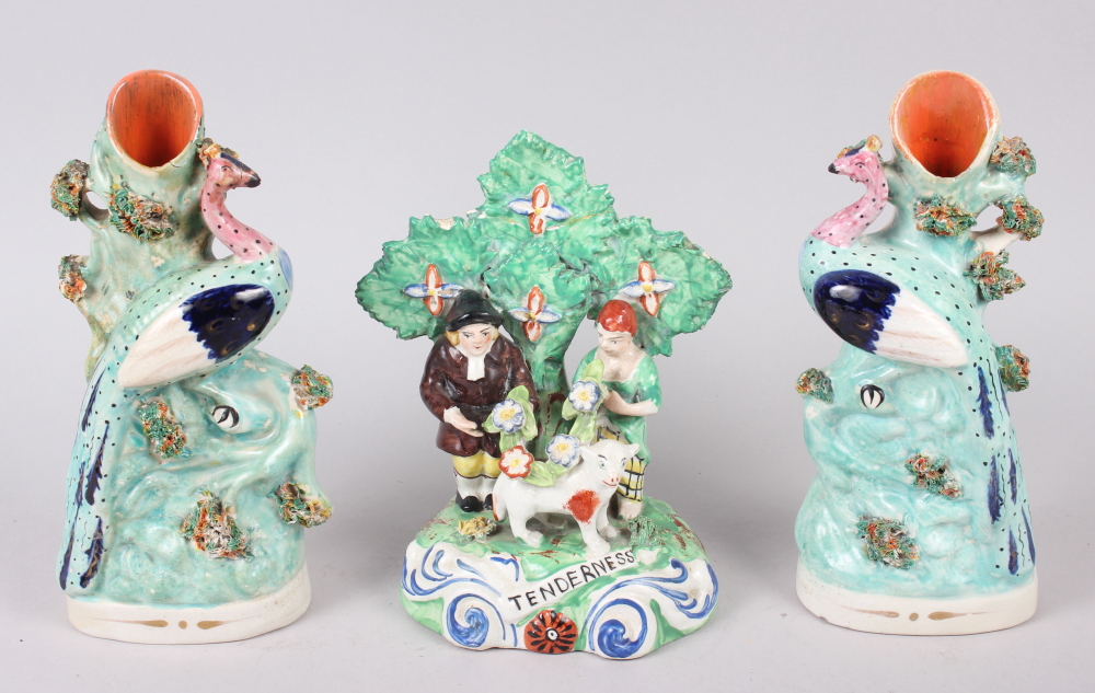A pair of 19th century Staffordshire spill vases, 8" high (restorations), and a Staffordshire
