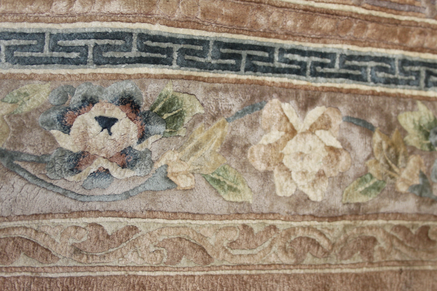 A Chinese silk carpet decorated thirteen floral panels on a beige ground and main floral border - Image 3 of 7