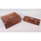 A 19th century rosewood writing box inset brass corners, 12" across, and a boxed calligraphy set