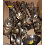 A selection of silver plated Kings pattern flatware, a plated soup ladle and other plated flatware
