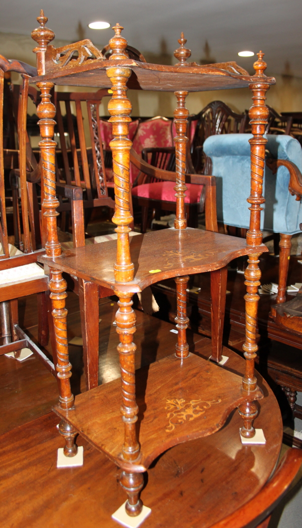 A Victorian walnut three-tier whatnot inlaid vase design, 19" wide and two Victorian circular