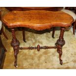 A Victorian walnut rectangular occasional table, on turned and carved end supports