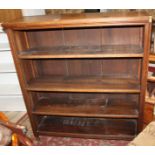 An oak open bookcase, fitted adjustable shelves, 43" wide