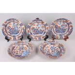 Five 18th century Chinese Imari decorated shallow bowls with gilt highlights, 9" dia (damages)