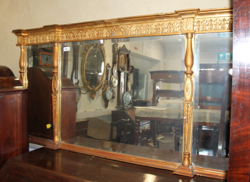 A Regency design gilt wood framed three-plate overmantel mirror, 54" x 26"