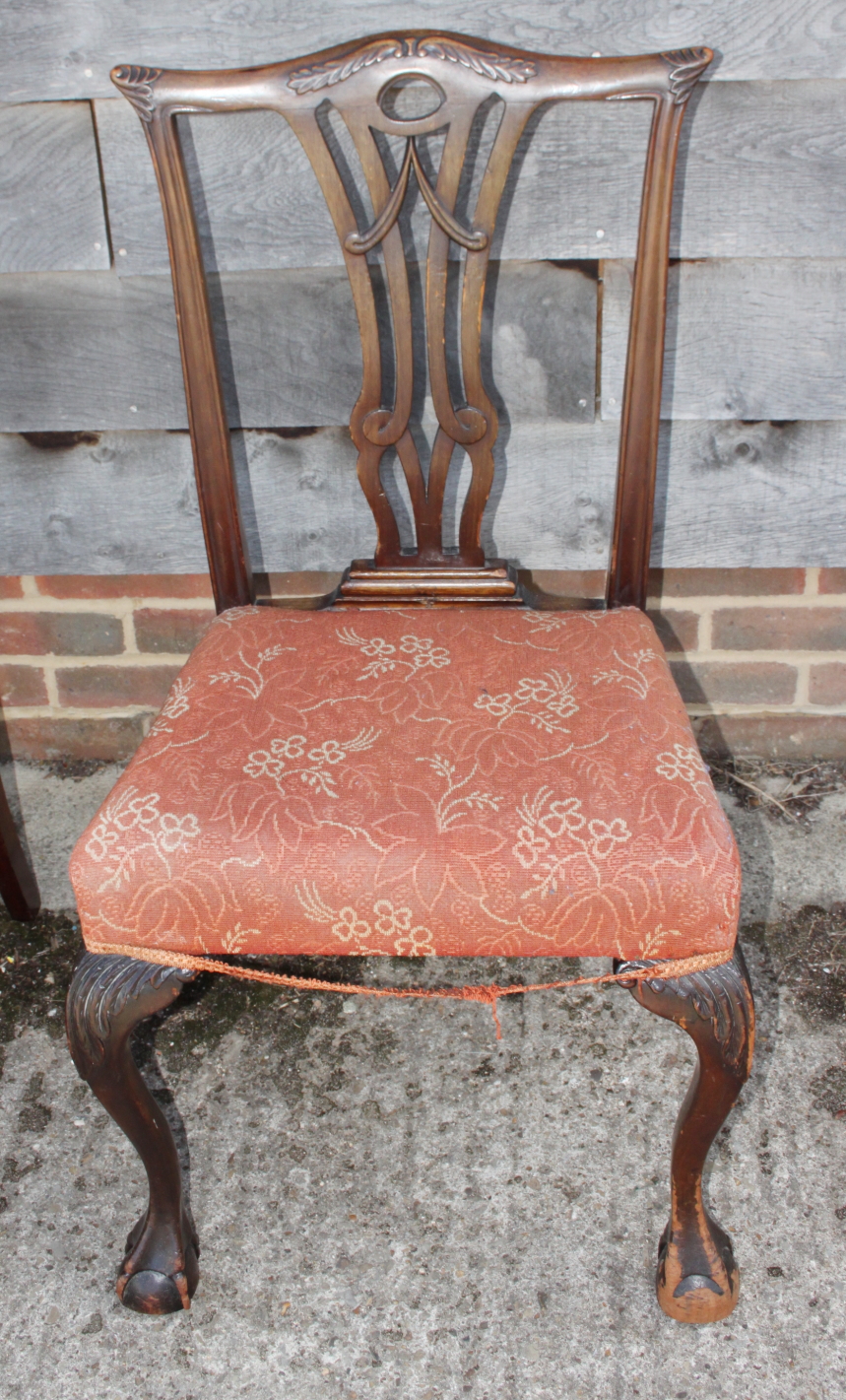 A Chippendale design mahogany chair with moquette seat panel