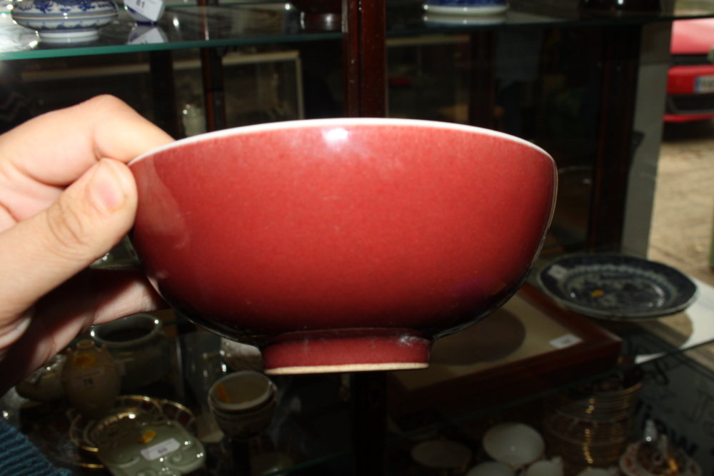 A Chinese sang de beouf bowl, 5 3/4" dia, a similar dish and a green glazed raised dish - Image 24 of 29