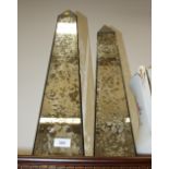 A pair of "antique" mirrored glass obelisks, 25" high