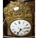 A French embossed brass comtoise wall clock with white enamel dial by Lucas a Guitres compensating