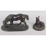 A bronzed model of a horse with a dog, on oval base, 8" wide, and a cold cast bronze model of a deer