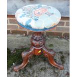 A mid 19th century carved rosewood circular adjustable seat piano stool, on tripod splay support