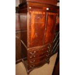 A Georgian design mahogany two-stage cupboard with base fitted four drawers, a yew wood telephone