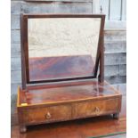 A 19th century mahogany toilet mirror, on plateau base fitted two drawers, 19" wide