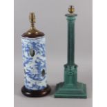 A Chinese blue and white cylinder vase with pierced and landscape decoration (now converted as a