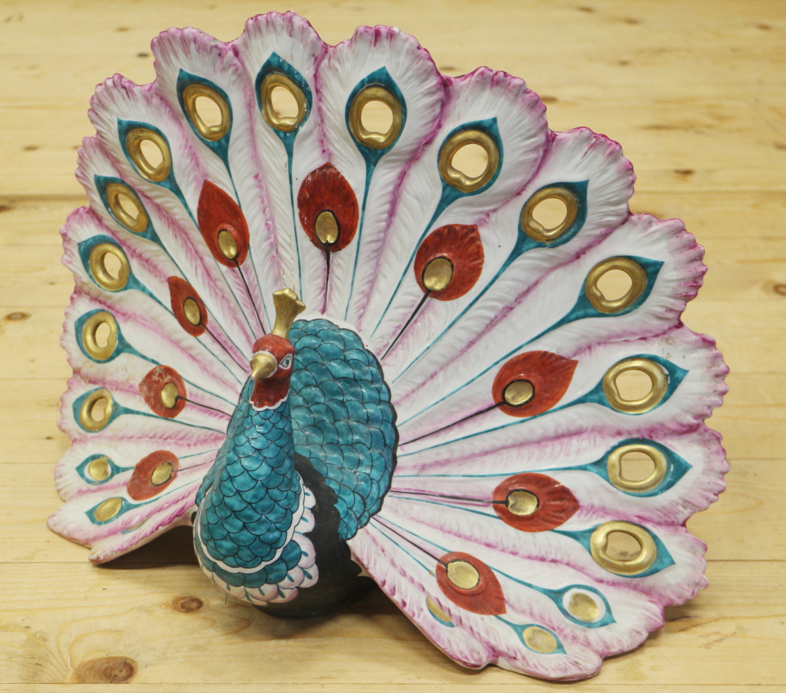 An Artistica porcelain model of a peacock, 13" high