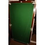 A tabletop slate-bed snooker table with cues and accessories, 34" x 64" approx