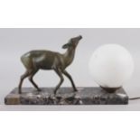 An Art Deco Limousin table lamp with deer and globe, on marble base, 12 1/2" wide