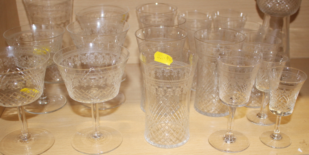 A part suite of Edwardian drinking glasses with cut and engraved decoration, and a thistle-shaped - Image 2 of 2