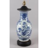A Chinese blue and white baluster shaped table lamp, 12 1/2" high, a studio pottery table lamp and a