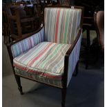 An Edwardian mahogany and line inlaid showframe armchair, upholstered in a striped fabric