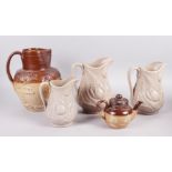 A stoneware hunting jug, 8 3/4" high, a Royal Doulton stoneware teapot with silver rim, 4 1/4" high,