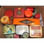 A collection of tins, including Jacobs, money boxes, flour bins and other similar items