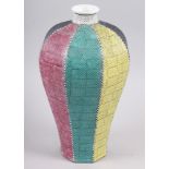 A Chinese octagonal meiping vase, decorated monochrome coloured sides with a scale finish, 12 1/2"